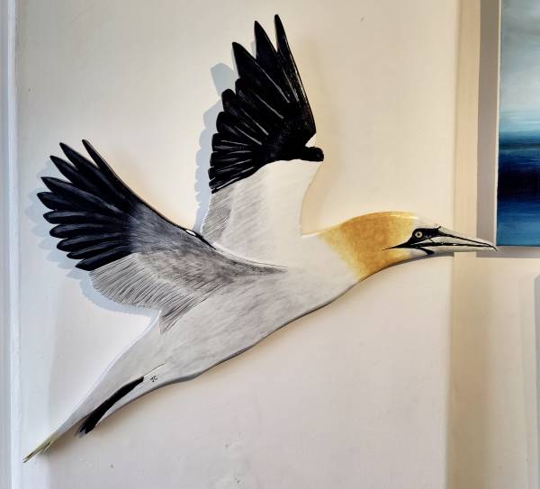 - a , wood Sculpture by John Comley, measuring 45 x 72 cm (H x W) £320